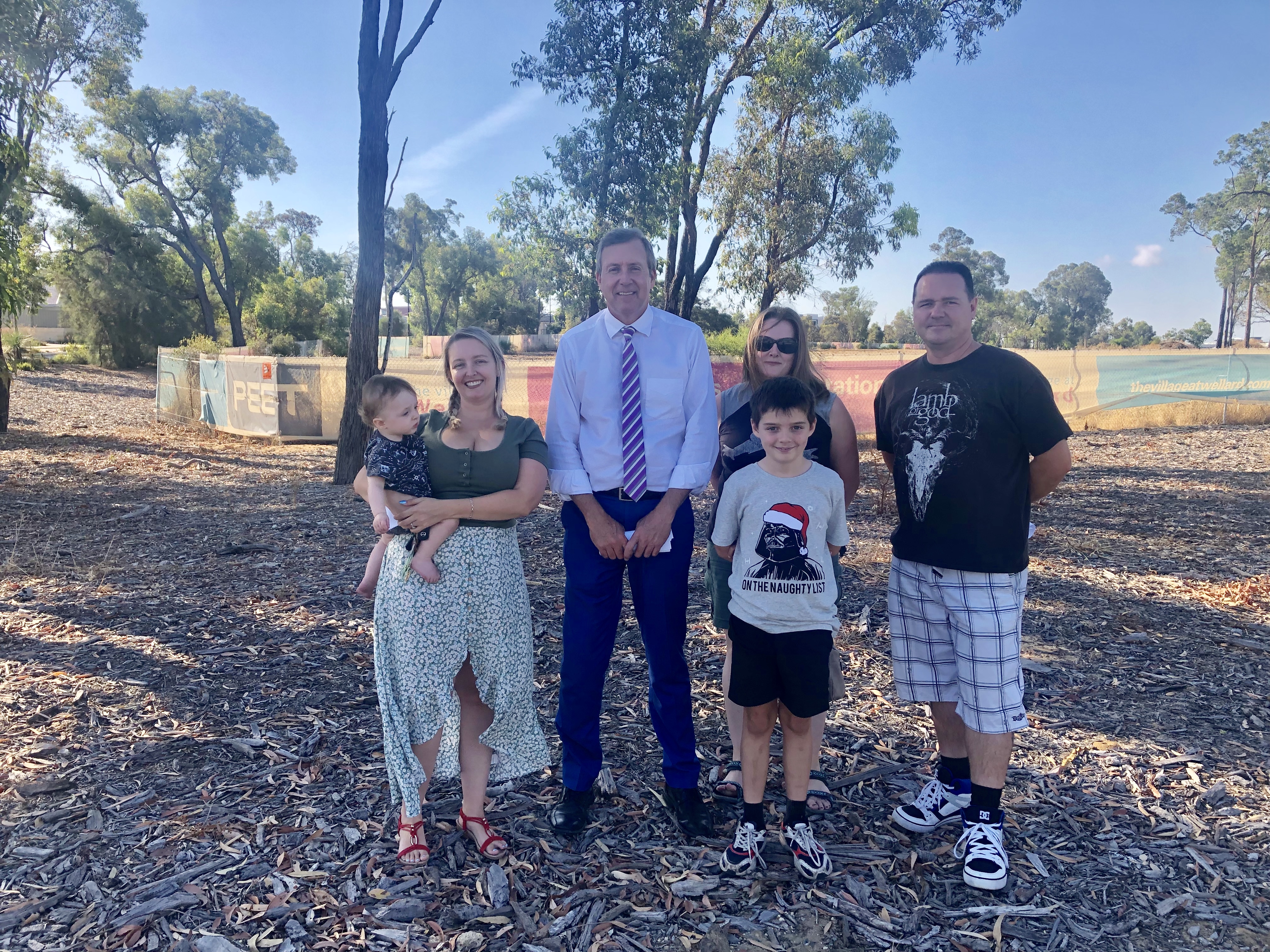 Reece and local families at the site of the new Wellard Village Primary School